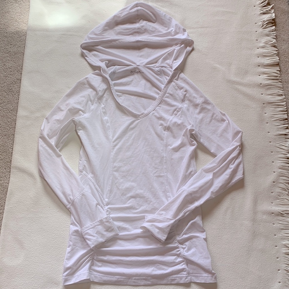 ZELLA White running top with Hood and reflective details M runs Small